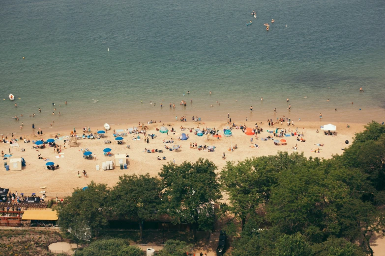 this is a beach that has many people on it