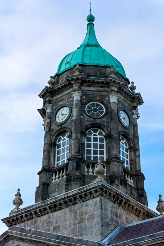 a clock tower at the end of an old church