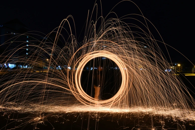 a large circle is surrounded by sparklers