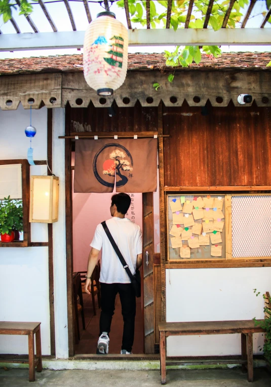 a man standing in an open door way