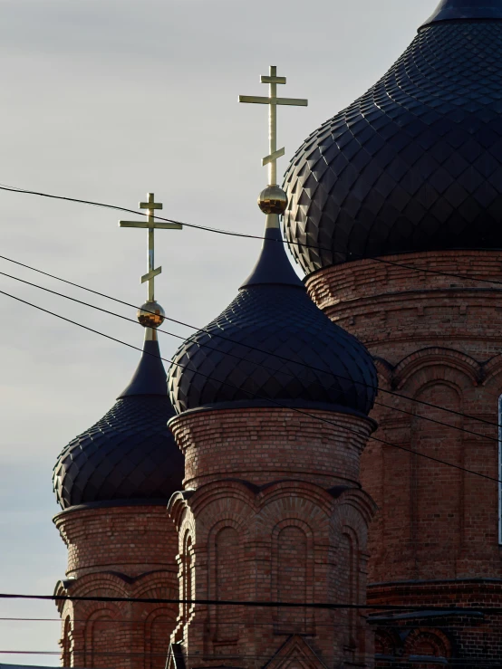 a view of the roof of two gothic style buildings