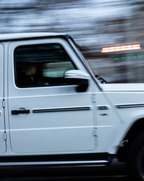 a mercedes benz w160 is shown as a blurred image