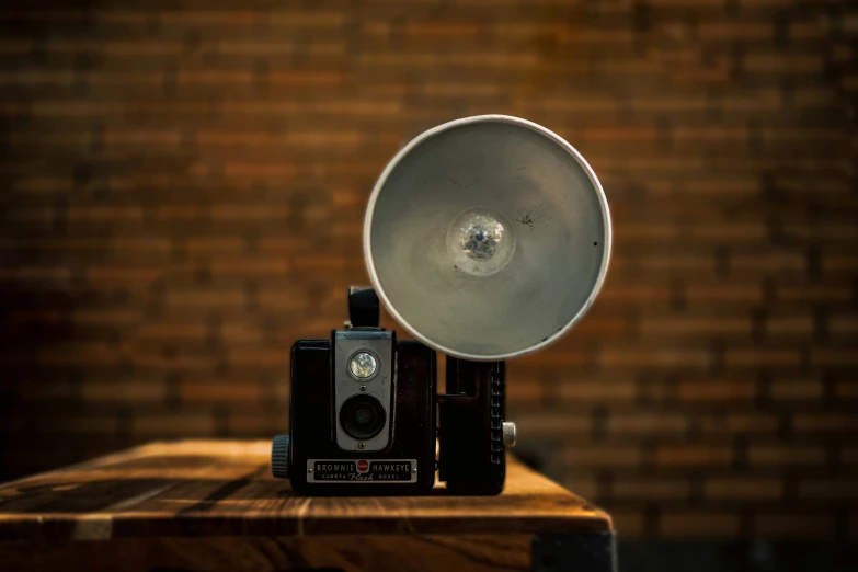 an antique record player and an old camera