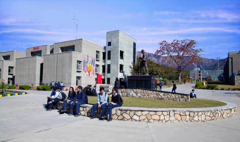 some s are sitting on the top of a bench