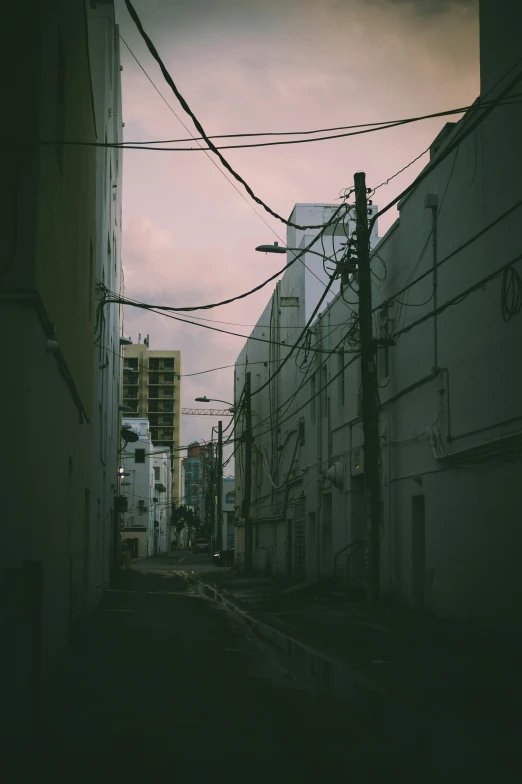 a city street with many power lines above it