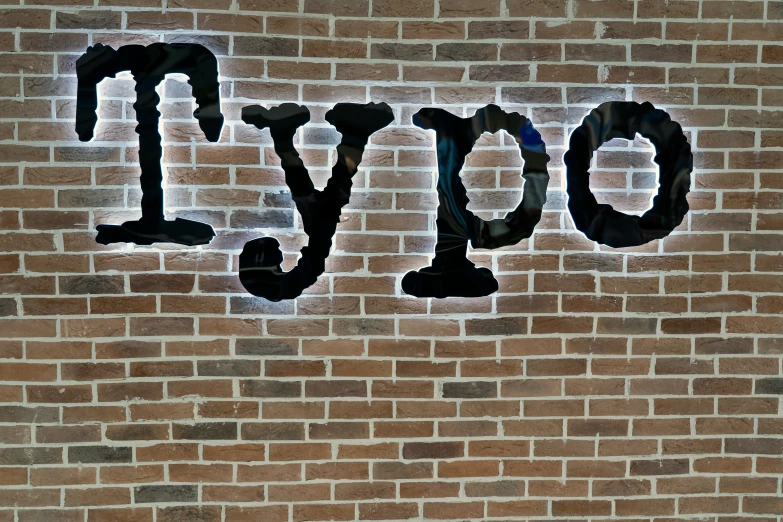the word joy spelled out with torn paper