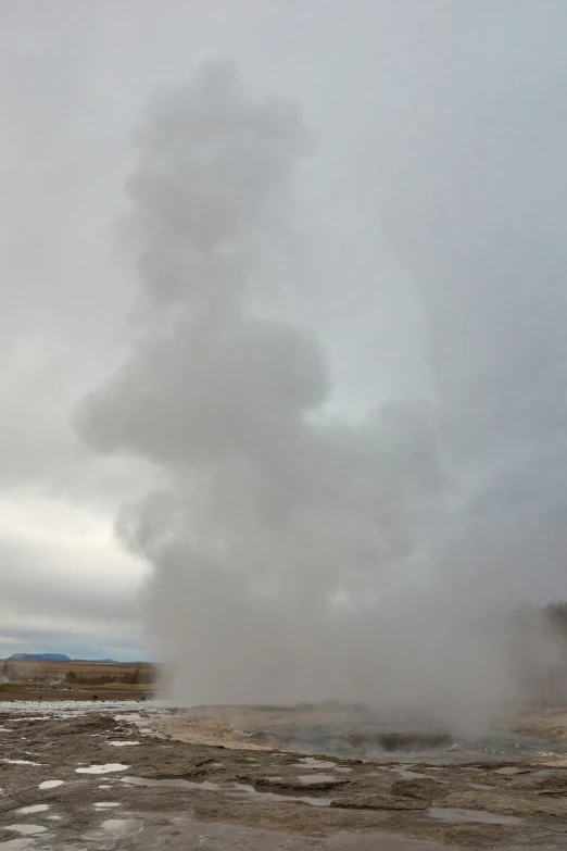 large steam pipes sticking out of the ground