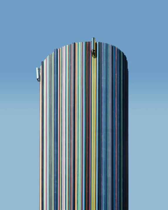 a round object with multiple colorful vertical lines