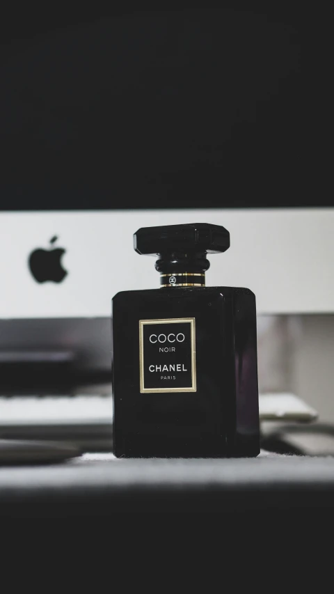 a bottle of coco noir chanel on a table