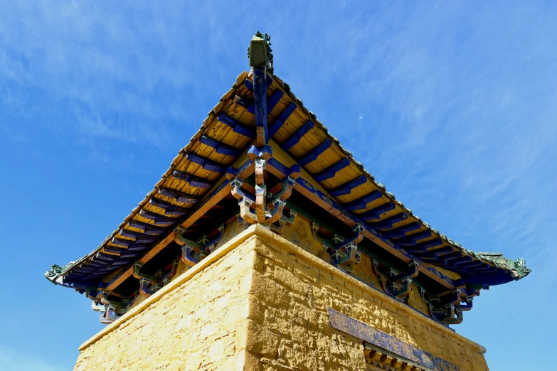 a structure in the middle of a building with a clock tower