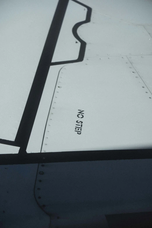 the back of a plane showing the wing