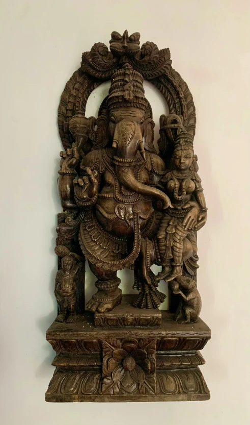 a decorative statue of an elephant in the shape of a statue