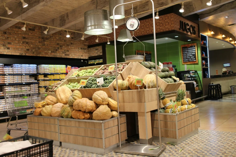 an open market area with fruits and vegetables