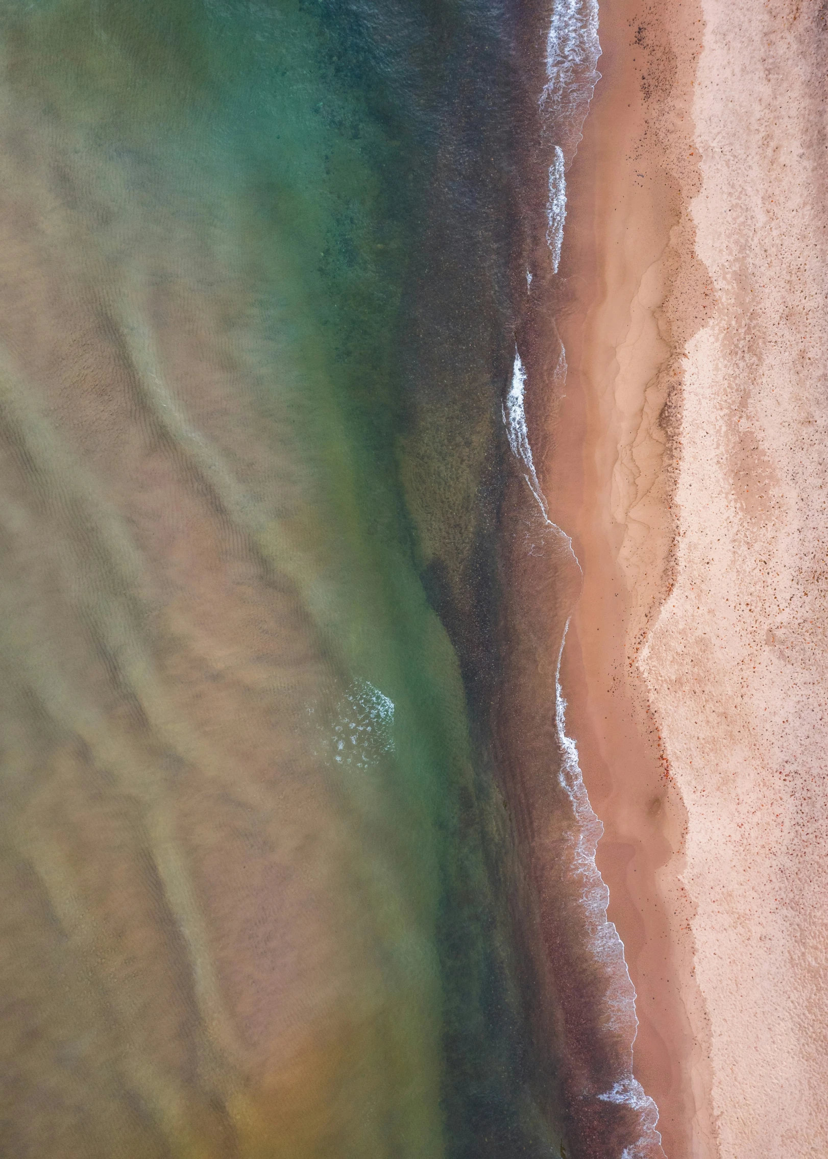 an aerial s of the beach and the ocean