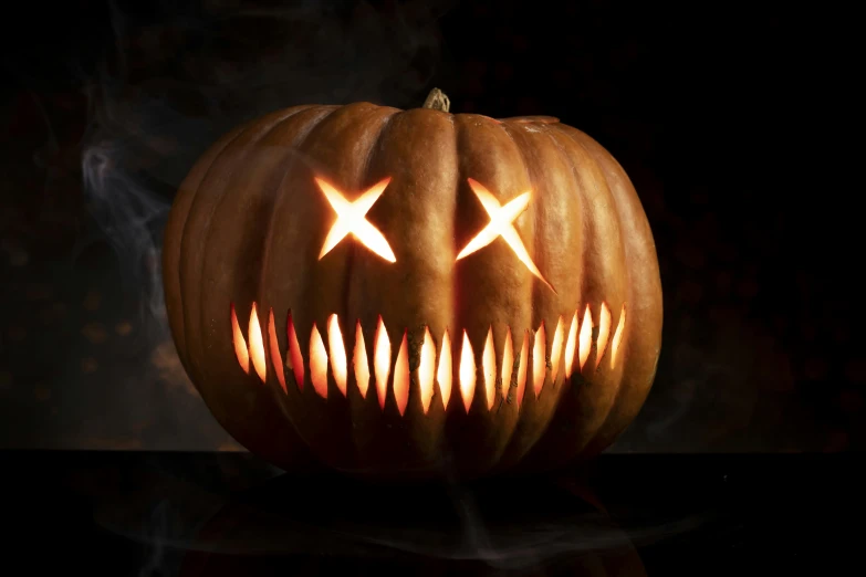 pumpkin with two crossed sabers carved into it