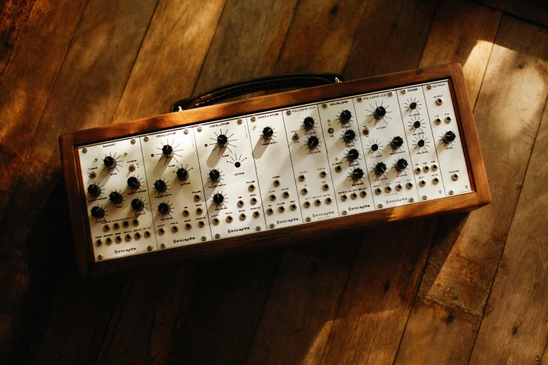 an old amplifier console on a wood floor