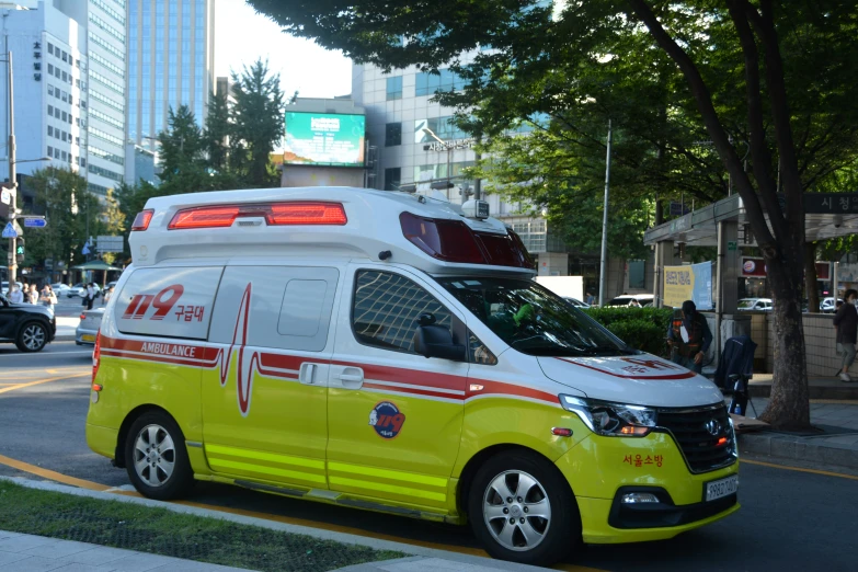 an ambulance is stopped on the street for people to use