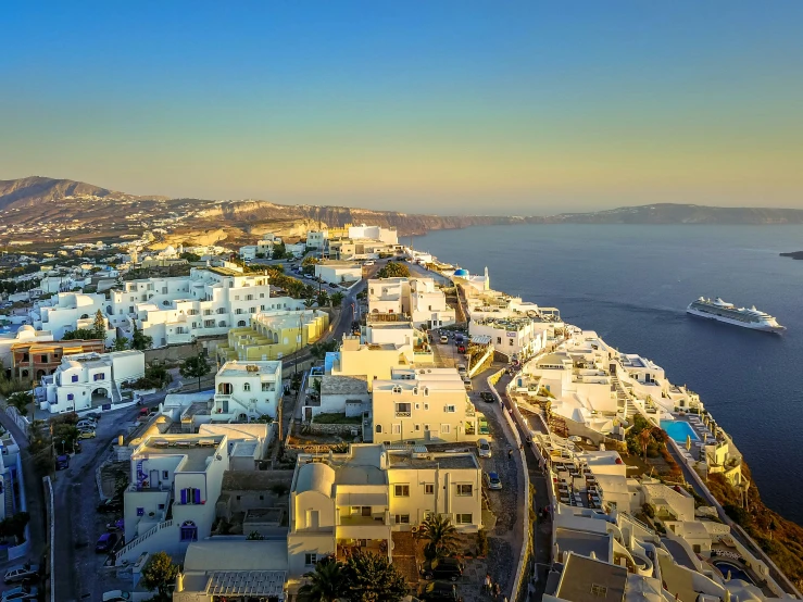 an aerial view of the town and the ocean