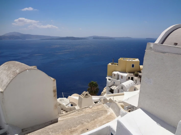 white buildings overlook a body of water