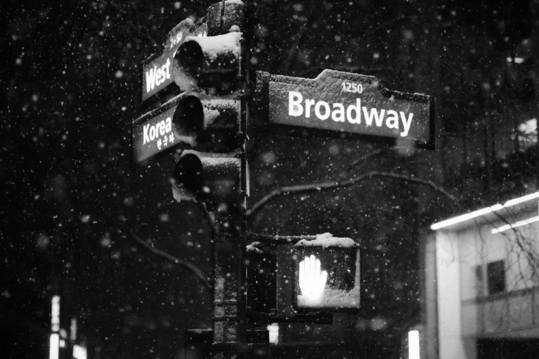 a black and white po shows the corner of broadway