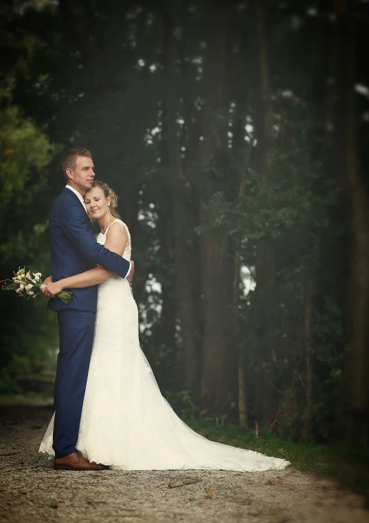 the couple are posing for their wedding pograph