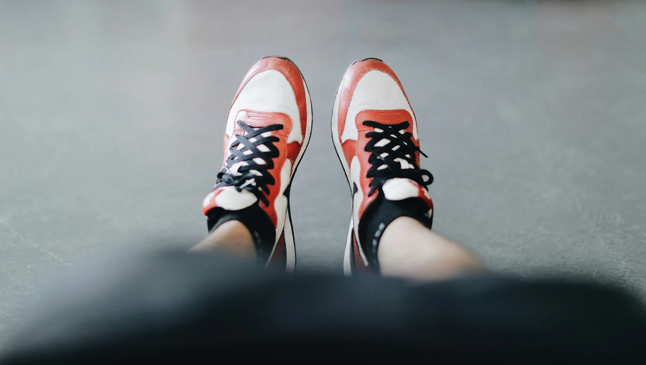 a pair of shoes that are on the ground