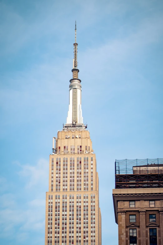 a skyscr building with an observation deck on the roof