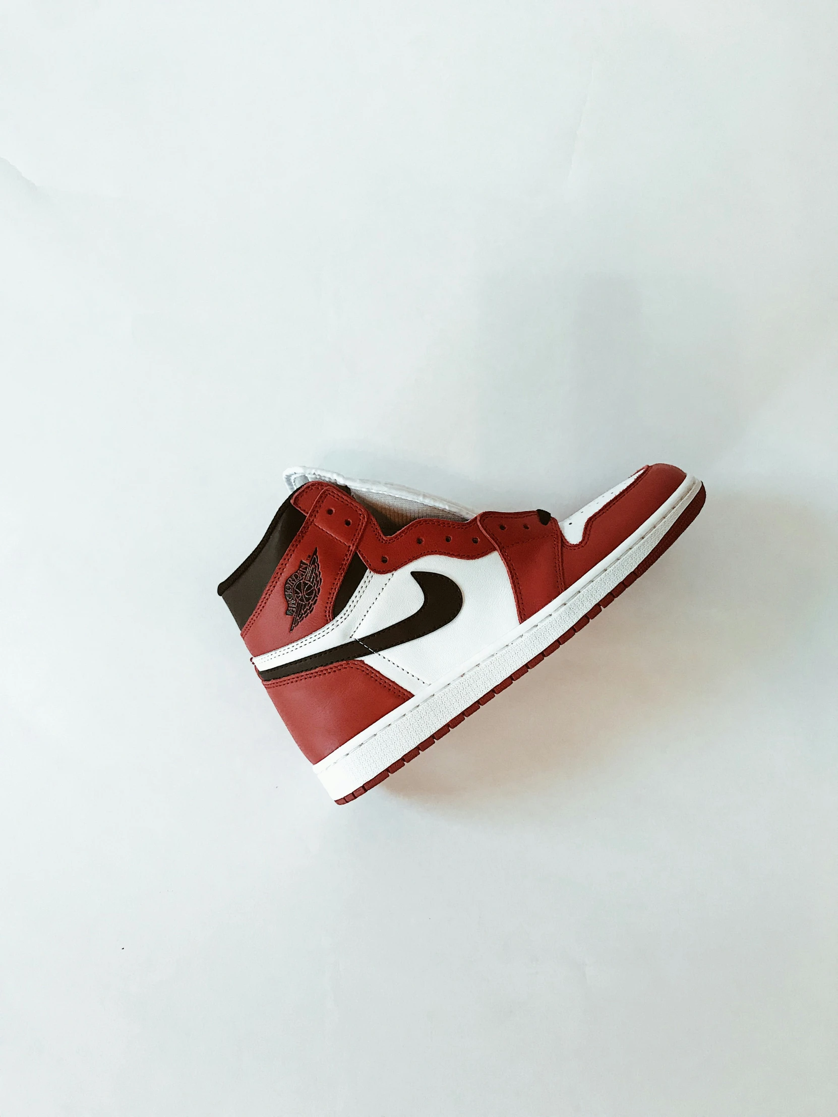 jordan 1 high og bred on white and red with black lettering