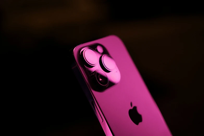 the front end of an apple iphone in bright pink