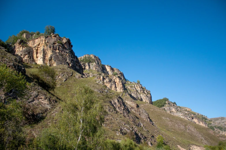 the view of a mountainous area as seen from the bottom