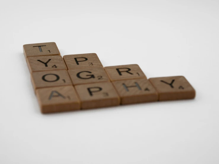 a po of a scrabble text puzzle piece