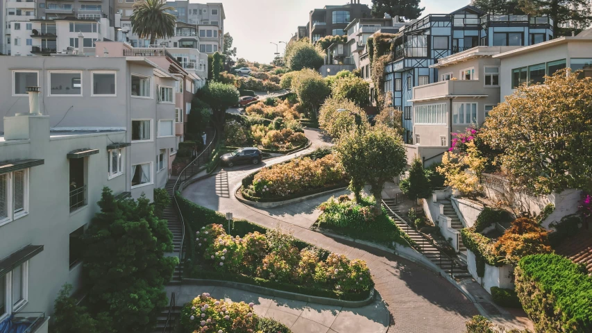 a residential street is surrounded by buildings