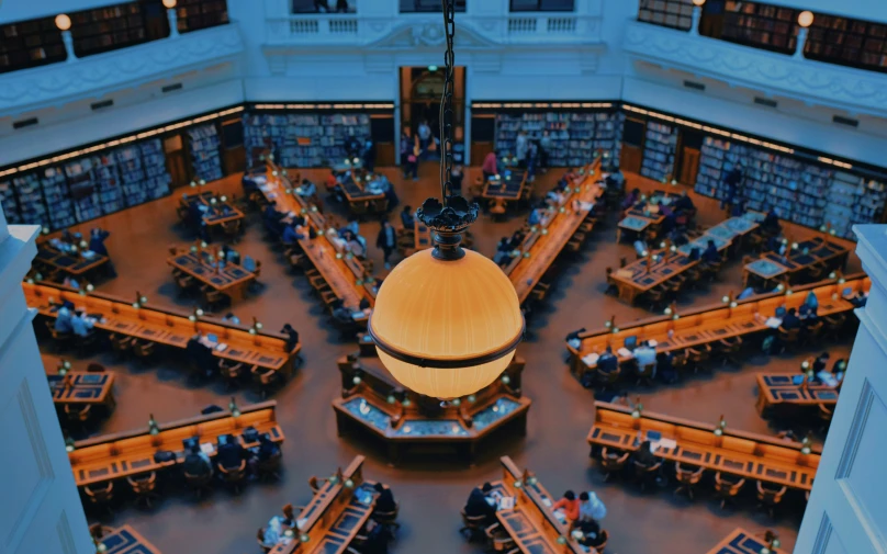 a large circular wooden area with tables in it