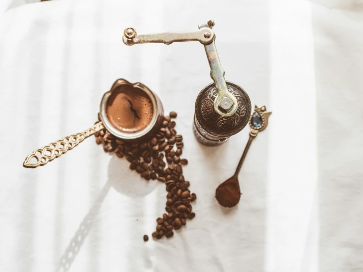 the items to make the coffee blender on the linens