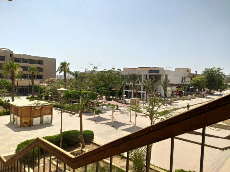 an aerial s shows a courtyard and a building