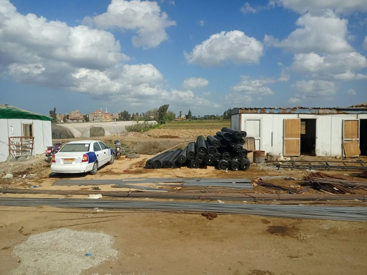 a van is parked outside a small building