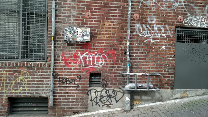 an old building with graffiti on the walls