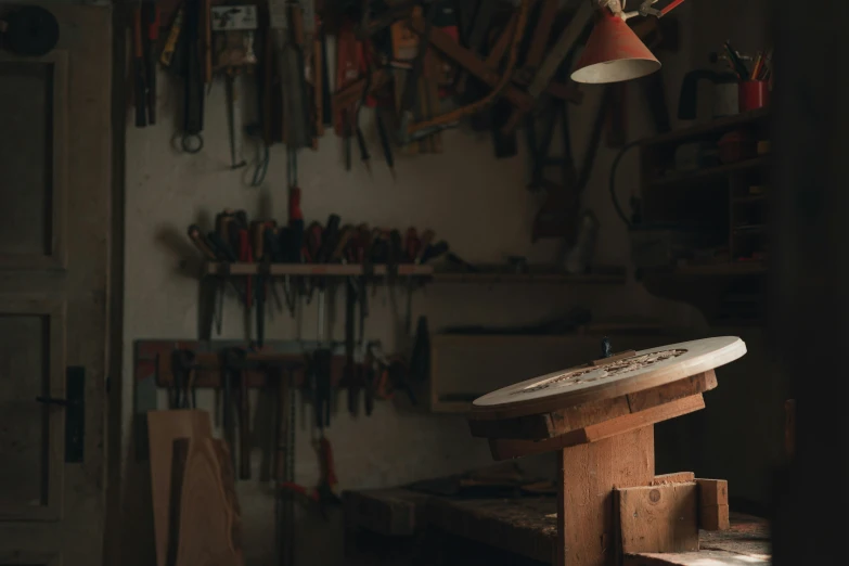 a person is in a workshop working on soing