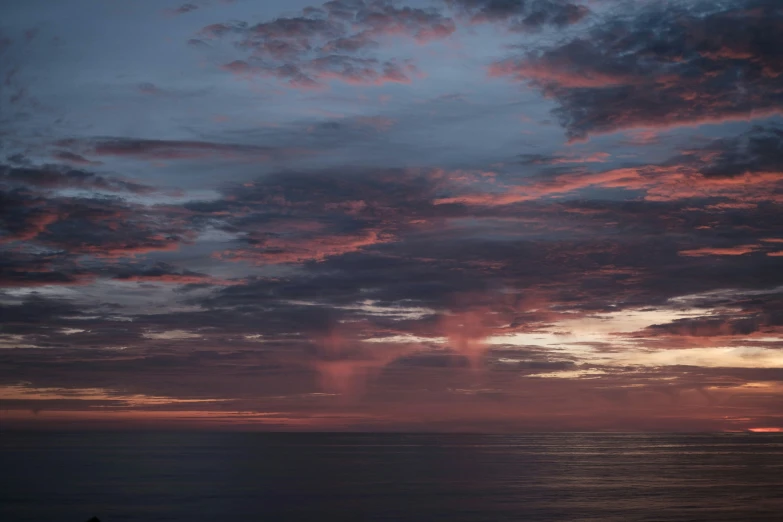 a beautiful sky with white clouds and pink colors