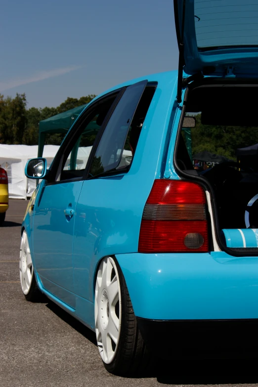 a closeup view of the tailgates on a blue car