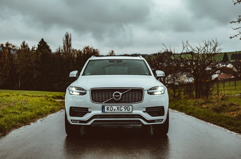 an image of a car parked on the side of a road