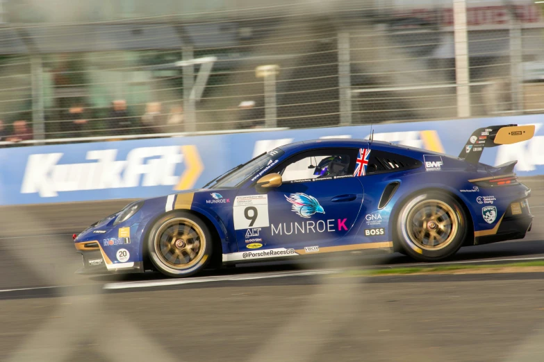 a car driving on a track during a race