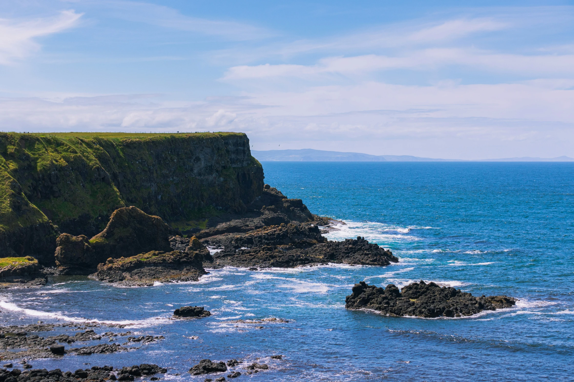 this is a view of the cliffs that rise out of the ocean