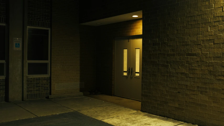 the door to the building is shown in the dark