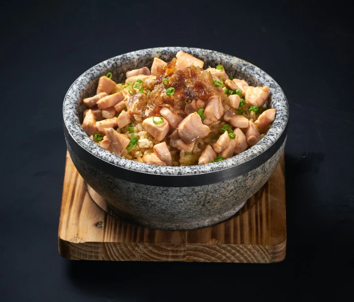 a small bowl filled with various food items