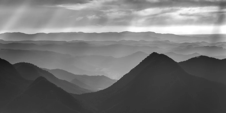 a very large mountain range with a sky background