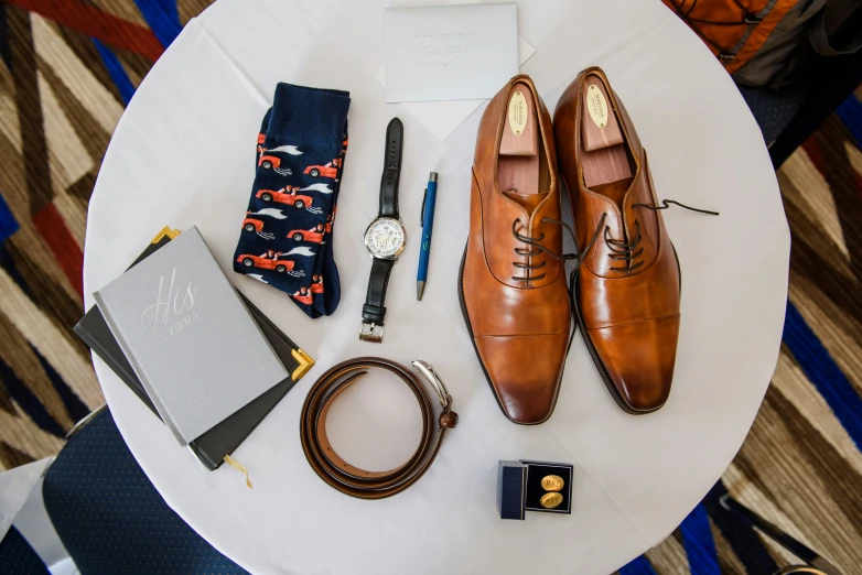 several items are displayed on a table for wedding