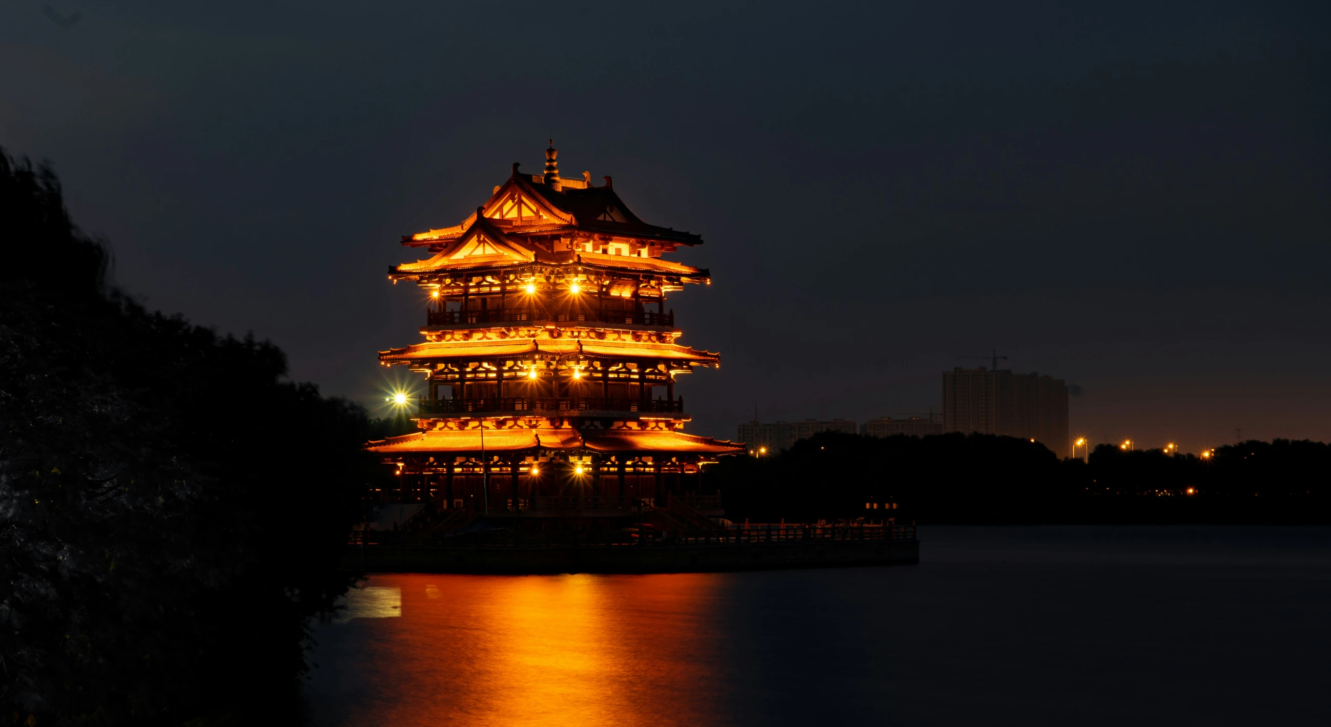 a tower lit up by light from the lights on