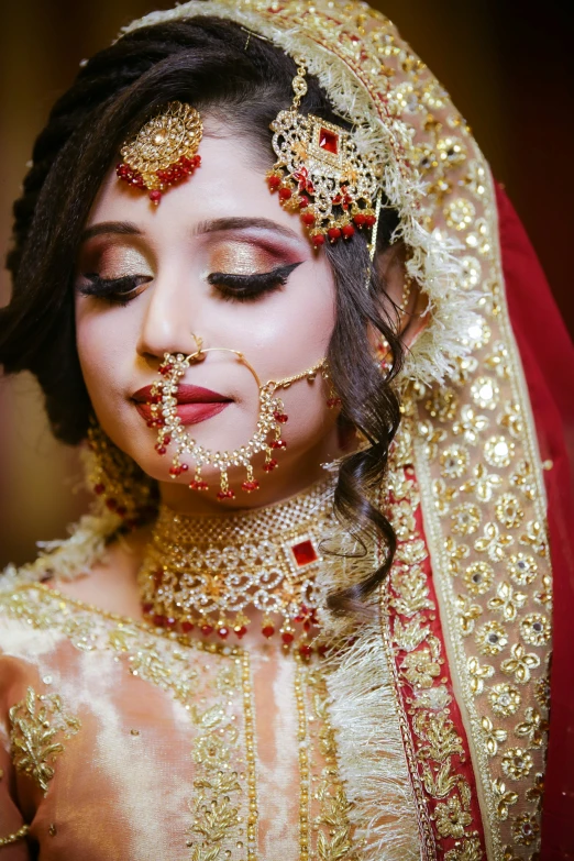 a woman dressed in a bridal fashion