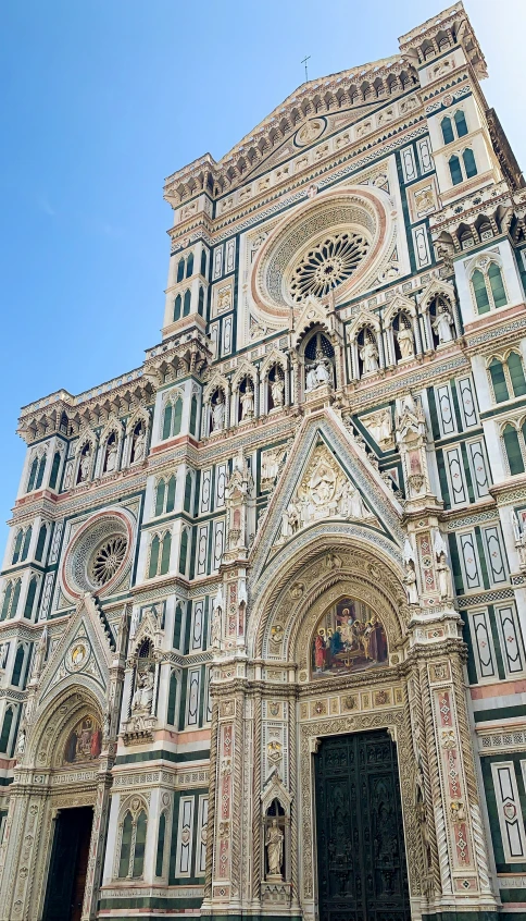 a large cathedral building with a massive stone entrance